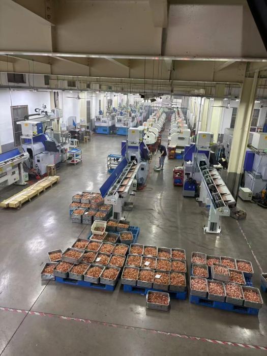 Production team and workshop equipment at the Changzhou Anchu Welding Equipment factory in Changzhou, Jiangsu.